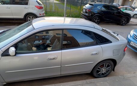 Mazda 323, 1998 год, 450 000 рублей, 2 фотография
