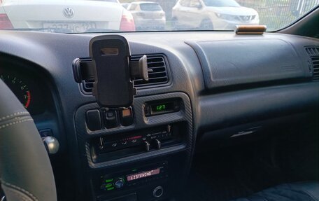 Mazda 323, 1998 год, 450 000 рублей, 8 фотография