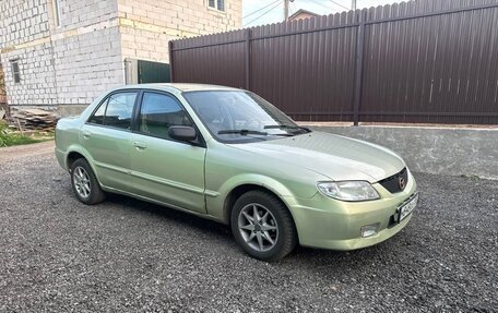 Mazda Protege, 2001 год, 300 000 рублей, 4 фотография