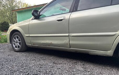Mazda Protege, 2001 год, 300 000 рублей, 5 фотография