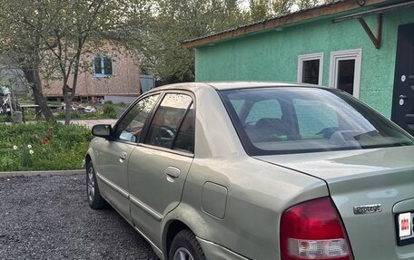 Mazda Protege, 2001 год, 300 000 рублей, 9 фотография