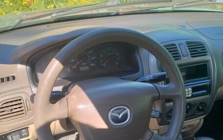 Mazda Protege, 2001 год, 300 000 рублей, 14 фотография