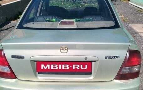 Mazda Protege, 2001 год, 300 000 рублей, 10 фотография