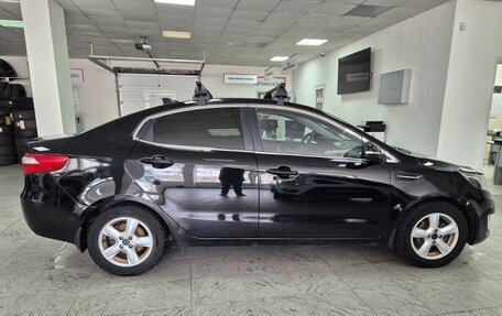 KIA Rio III рестайлинг, 2011 год, 699 000 рублей, 3 фотография