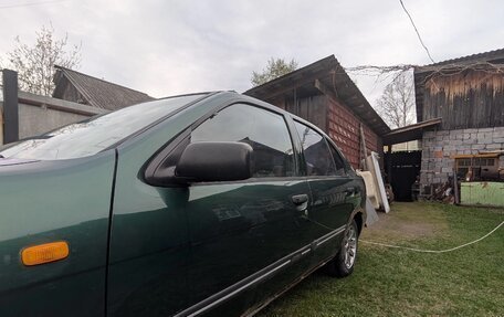 Nissan Almera, 1997 год, 150 000 рублей, 4 фотография