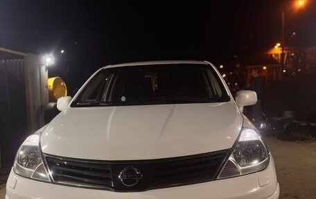 Nissan Tiida, 2010 год, 750 000 рублей, 9 фотография