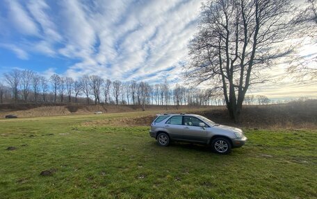 Lexus RX IV рестайлинг, 2003 год, 880 000 рублей, 10 фотография
