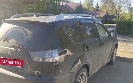 Mitsubishi Outlander III рестайлинг 3, 2010 год, 890 000 рублей, 4 фотография