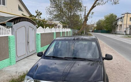 Renault Logan I, 2012 год, 410 000 рублей, 4 фотография