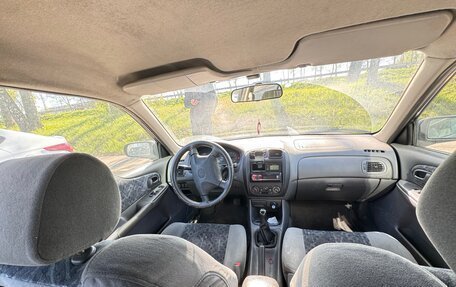 Mazda 323, 1998 год, 210 000 рублей, 5 фотография