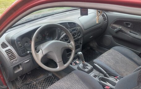 Mitsubishi Colt VI рестайлинг, 1999 год, 160 000 рублей, 6 фотография