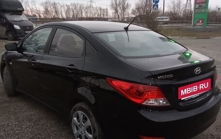 Hyundai Solaris II рестайлинг, 2013 год, 700 000 рублей, 3 фотография