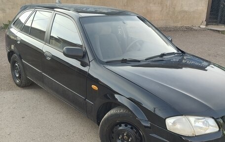 Mazda 323, 2000 год, 350 000 рублей, 10 фотография