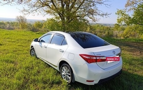 Toyota Corolla, 2014 год, 1 300 000 рублей, 7 фотография