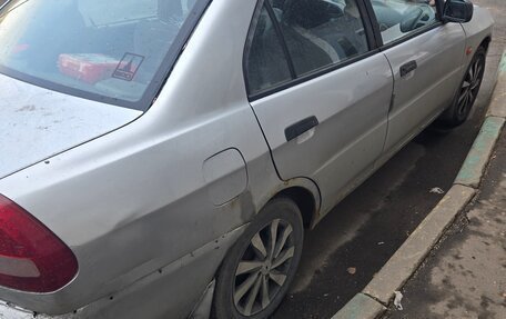 Mitsubishi Lancer VII, 1997 год, 89 000 рублей, 4 фотография