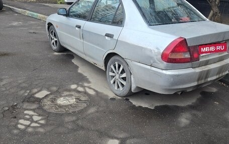 Mitsubishi Lancer VII, 1997 год, 89 000 рублей, 11 фотография