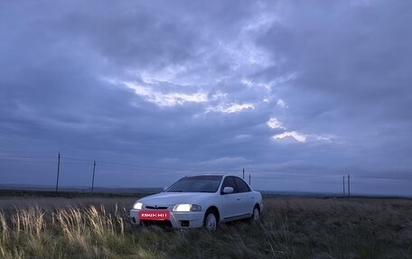 Mazda Familia, 1997 год, 200 000 рублей, 7 фотография