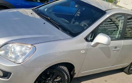 KIA Carens III (RP), 2011 год, 600 000 рублей, 14 фотография