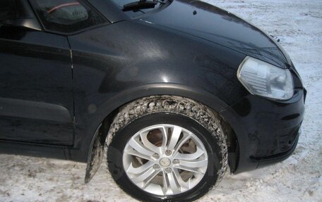 Suzuki SX4 II рестайлинг, 2011 год, 1 100 000 рублей, 10 фотография