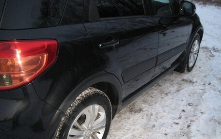 Suzuki SX4 II рестайлинг, 2011 год, 1 100 000 рублей, 11 фотография