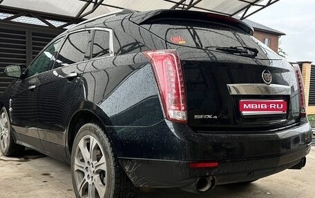 Cadillac SRX II рестайлинг, 2012 год, 1 500 000 рублей, 1 фотография