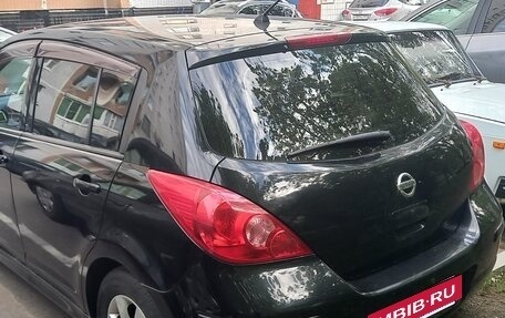 Nissan Tiida, 2010 год, 950 000 рублей, 9 фотография