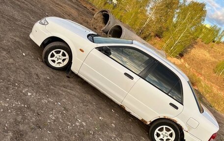 Mazda Familia, 2001 год, 270 000 рублей, 8 фотография
