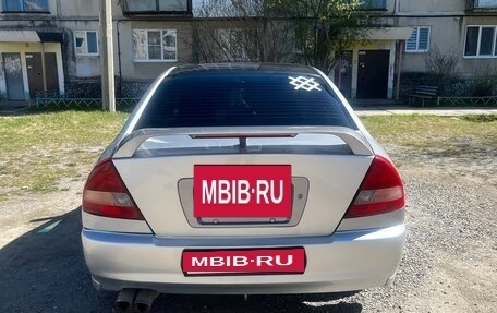 Mitsubishi Mirage VI рестайлинг, 1996 год, 290 000 рублей, 9 фотография