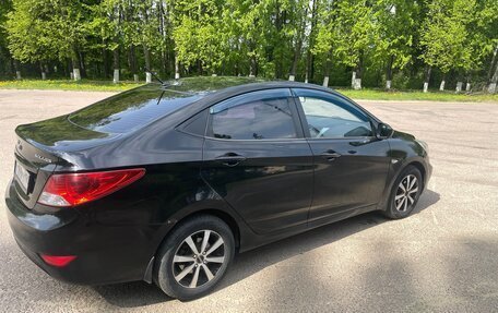 Hyundai Solaris II рестайлинг, 2011 год, 700 000 рублей, 4 фотография