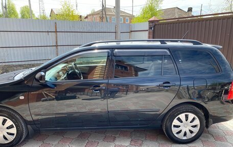 Toyota Corolla, 2004 год, 715 000 рублей, 10 фотография
