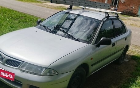 Mitsubishi Carisma I, 1997 год, 190 000 рублей, 1 фотография
