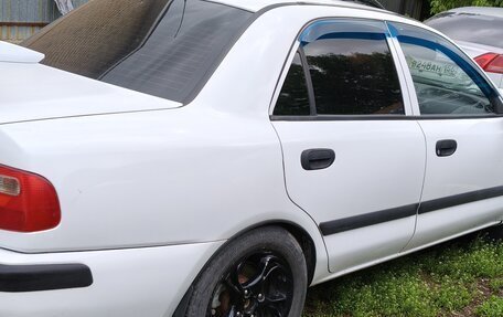 Mitsubishi Carisma I, 2003 год, 350 000 рублей, 4 фотография
