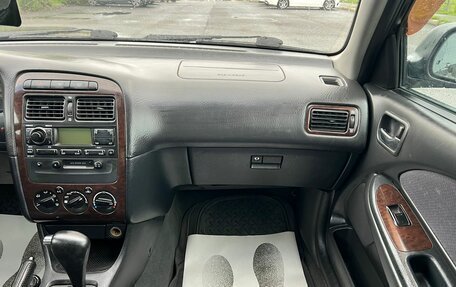 Toyota Avensis III рестайлинг, 2001 год, 499 999 рублей, 18 фотография