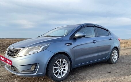 KIA Rio III рестайлинг, 2012 год, 750 000 рублей, 2 фотография
