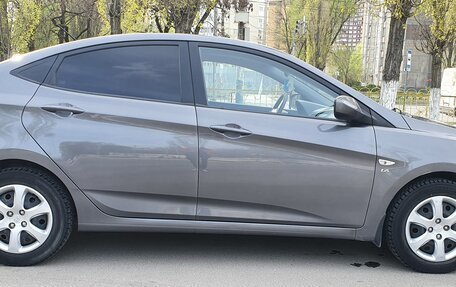 Hyundai Solaris II рестайлинг, 2011 год, 740 000 рублей, 18 фотография