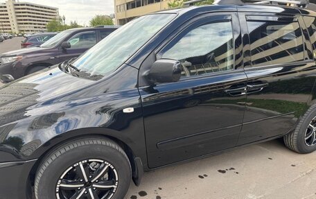KIA Carnival III, 2008 год, 900 000 рублей, 5 фотография