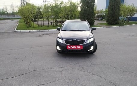 KIA Rio III рестайлинг, 2012 год, 650 000 рублей, 13 фотография