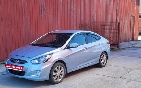 Hyundai Solaris II рестайлинг, 2011 год, 700 000 рублей, 2 фотография
