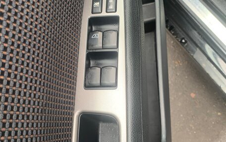 Nissan Tiida, 2010 год, 850 000 рублей, 9 фотография