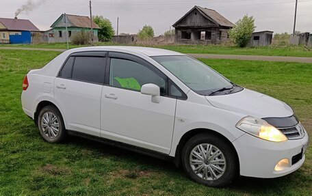 Nissan Tiida, 2010 год, 700 000 рублей, 6 фотография