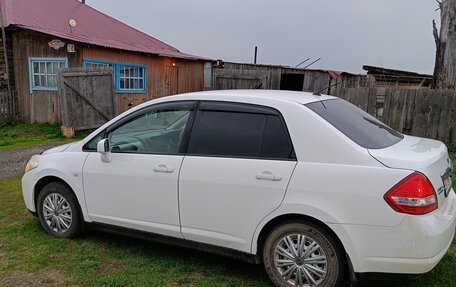 Nissan Tiida, 2010 год, 700 000 рублей, 8 фотография