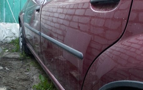 Renault Logan I, 2011 год, 300 000 рублей, 3 фотография