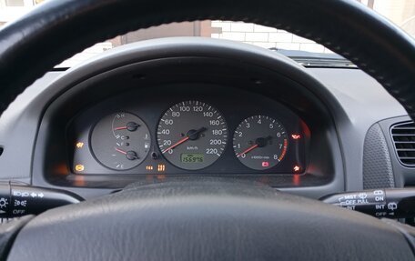 Mazda 323, 1999 год, 350 000 рублей, 9 фотография