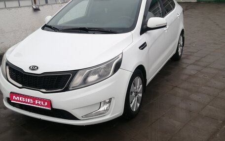 KIA Rio III рестайлинг, 2012 год, 910 000 рублей, 1 фотография
