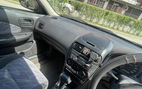 Nissan Wingroad III, 1999 год, 380 000 рублей, 13 фотография