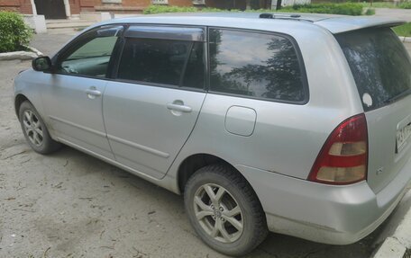 Toyota Corolla, 2001 год, 550 000 рублей, 4 фотография