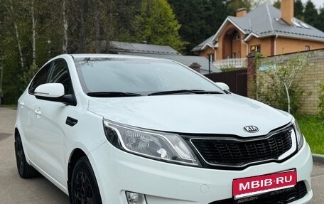 KIA Rio III рестайлинг, 2012 год, 989 000 рублей, 3 фотография