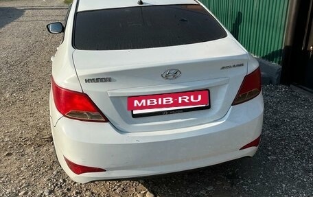Hyundai Solaris II рестайлинг, 2011 год, 700 000 рублей, 14 фотография