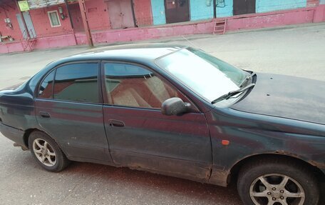 Toyota Carina E, 1998 год, 129 000 рублей, 4 фотография