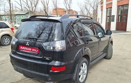 Mitsubishi Outlander III рестайлинг 3, 2011 год, 1 250 000 рублей, 15 фотография